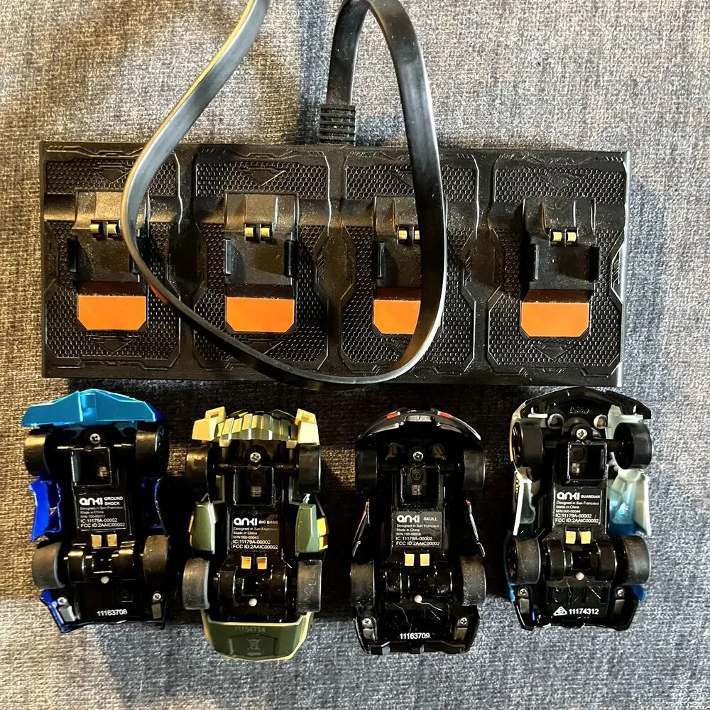 Anki Overdrive Lot of 4 Race Cars With Charging Base  *Untested with app*
